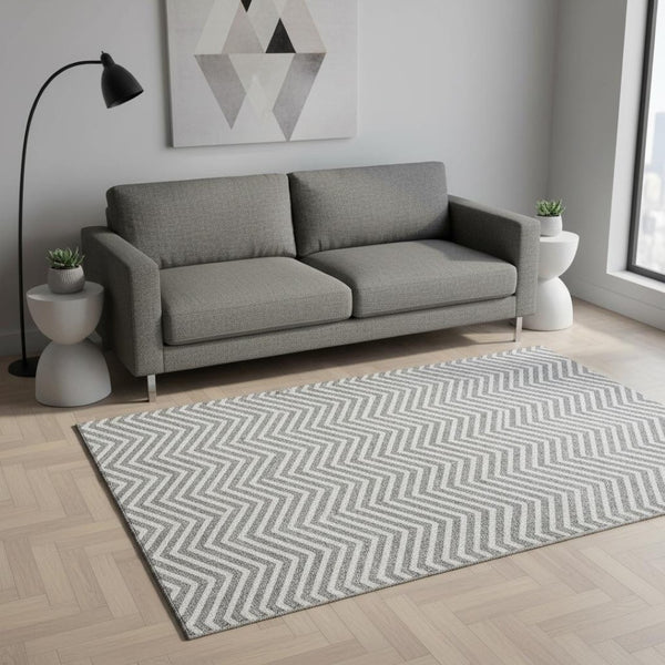 HomeRoots 5' X 8' Gray Chevron Area Rug – Washable, UV-Protected, Stain-Resistant for High-Traffic Homes 674241
