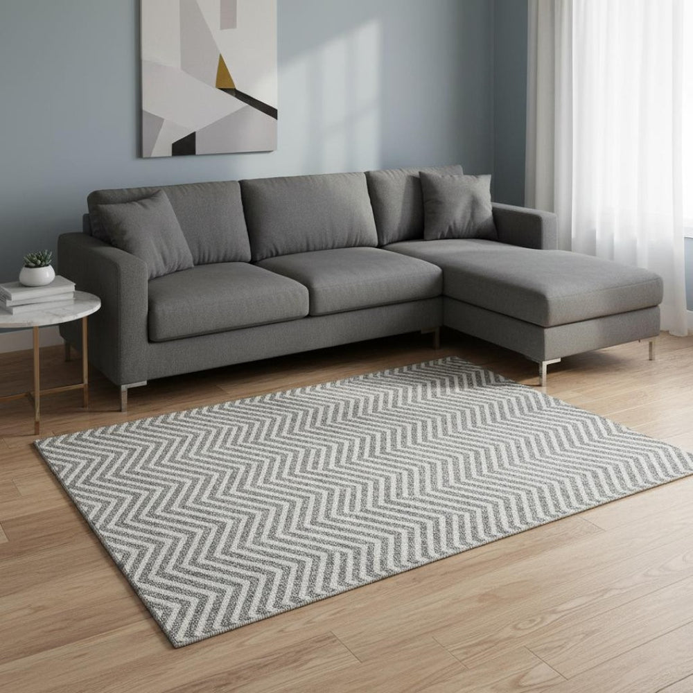 HomeRoots 9' X 12' Gray And Ivory Chevron Area Rug - Washable, UV Protected, Durable for Homes with Kids & Pets 674244