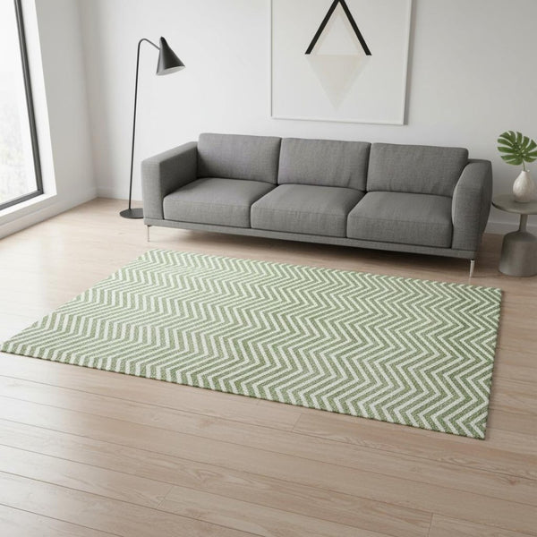 HomeRoots 5' X 8' Green And Ivory Chevron Area Rug - Stylish, Washable, UV-Protected for Modern Living Spaces! 674247