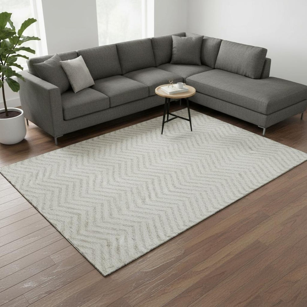 HomeRoots 8' X 10' Ivory Beige Chevron Area Rug - Washable, UV Protected, Ideal for High-Traffic Family Spaces 674255