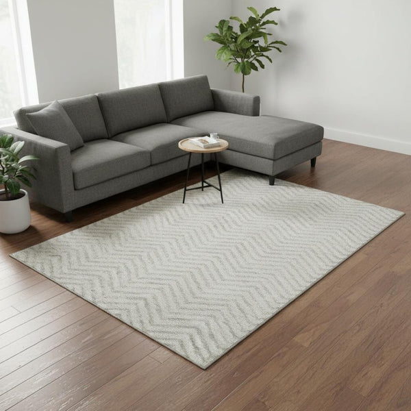 HomeRoots 9' X 12' Ivory and Beige Chevron Area Rug - Washable, UV-Protected, Stylish and Durable for Busy Homes 674256