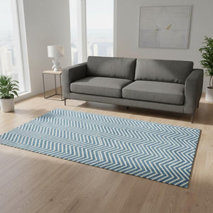 HomeRoots 5' X 8' Teal Chevron Area Rug - Washable, UV Protected, Durable Design for High-Traffic Family Spaces 674271