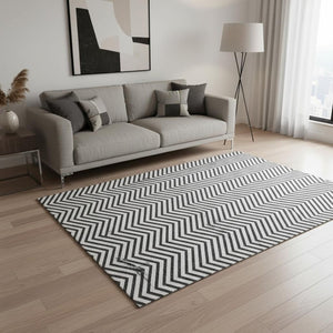 HomeRoots 5' X 8' Modern Black And White Chevron Area Rug - Washable, UV Protected, Stain Resistant Design 674277