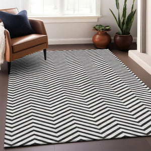 HomeRoots 8' X 10' Washable Black and White Chevron Area Rug - Durable, UV-Protected, Perfect for Any Space 674279