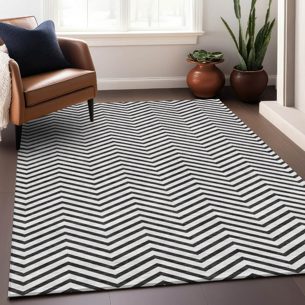HomeRoots 8' X 10' Washable Black and White Chevron Area Rug - Durable, UV-Protected, Perfect for Any Space 674279