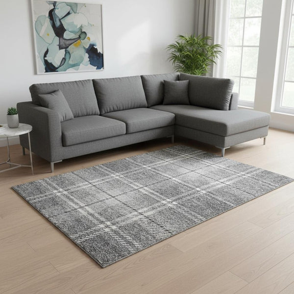 HomeRoots 9' X 12' Gray And Ivory Plaid Washable Area Rug - Stain Resistant, UV Protected for High-Traffic Homes 674316