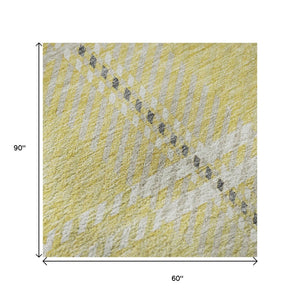 HomeRoots 5' X 8' Washable Yellow Ivory Gray Plaid Area Rug with UV Protection for Durable Stylish Living Spaces 674349