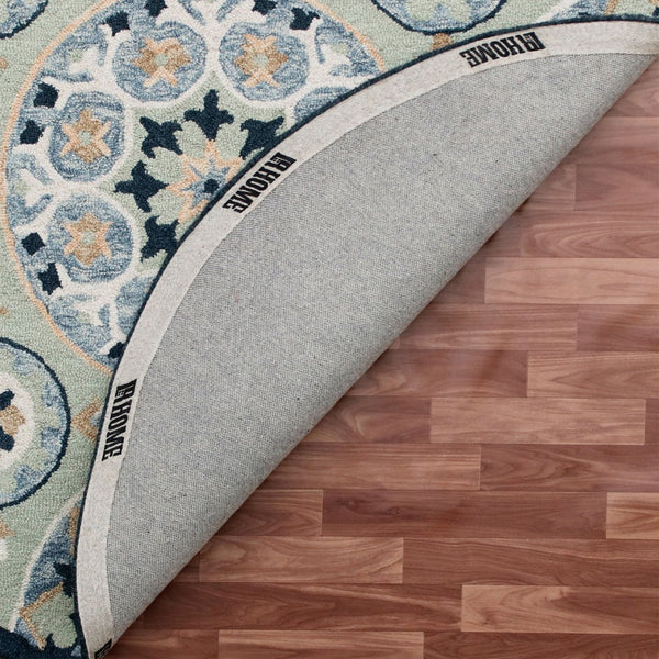 HomeRoots Wool Hand-Tufted Round Floral Rug - Artisan Crafted, Unique Design for Timeless Elegance & Comfort 674456