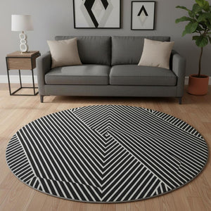 HomeRoots 8' Black And Ivory Geometric Round Rug - Washable, UV-Protected, Durable, Modern Design for Homes 674631