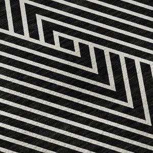 HomeRoots 8' Black And Ivory Geometric Round Rug - Washable, UV-Protected, Durable, Modern Design for Homes 674631