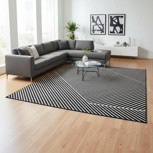 HomeRoots 8' X 10' Washable Black And Ivory Geometric Area Rug With UV Protection For Stylish Living Spaces 674632