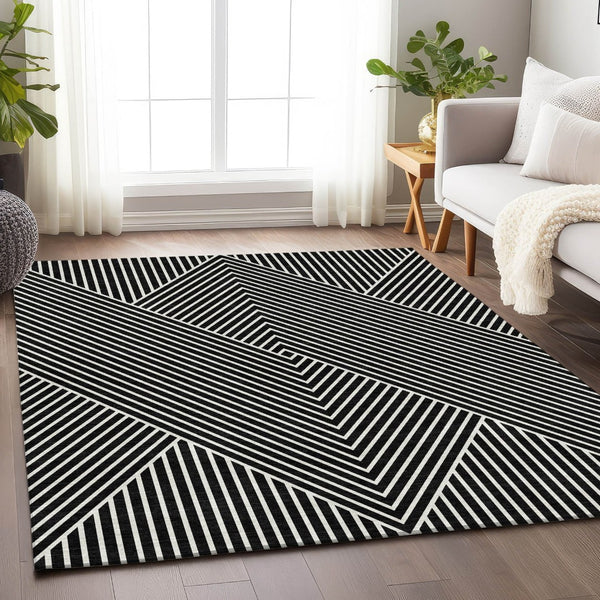 HomeRoots 9' X 12' Black And Ivory Geometric Area Rug – Washable, UV Protected, Durable, Ideal for Busy Homes 674633