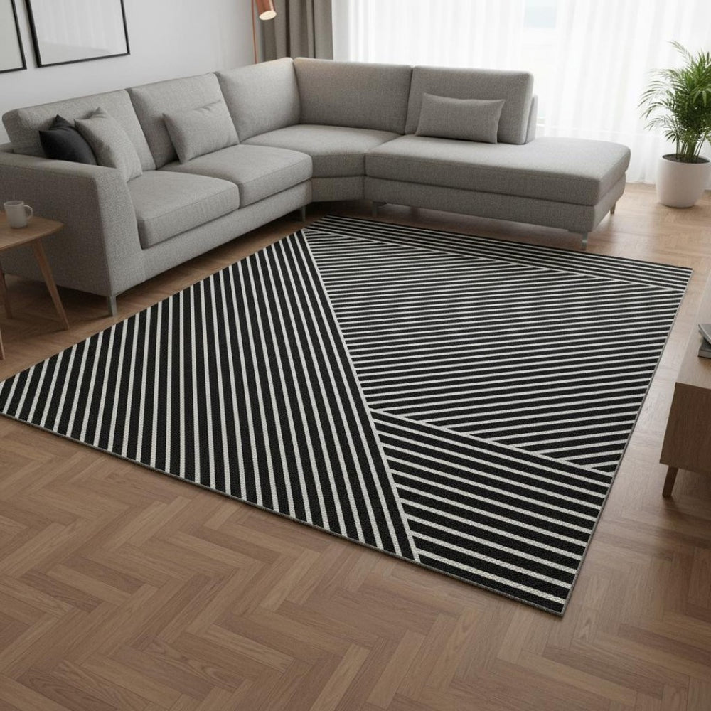 HomeRoots 10' X 14' Black And Ivory Washable Area Rug – Stylish, Durable, UV-Protected for High-Traffic Spaces 674634