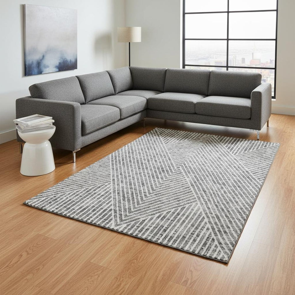 HomeRoots 10' X 14' Modern Gray and Ivory Geometric Area Rug – Washable, UV-Protected, Ideal for Homes with Kids & Pets 674658