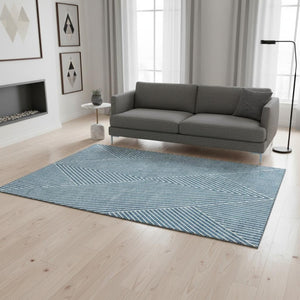 HomeRoots 5' X 8' Teal and Ivory Geometric Area Rug - Durable, Washable, UV-Protected for Modern Spaces 674672