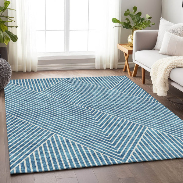 HomeRoots 5' X 8' Teal and Ivory Geometric Area Rug - Durable, Washable, UV-Protected for Modern Spaces 674672