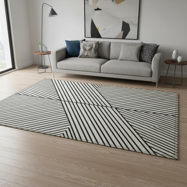 HomeRoots 5' X 8' Modern White and Black Geometric Area Rug - Washable, UV Protected, Stain Resistant Design 674684