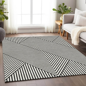 HomeRoots 5' X 8' Modern White and Black Geometric Area Rug - Washable, UV Protected, Stain Resistant Design 674684
