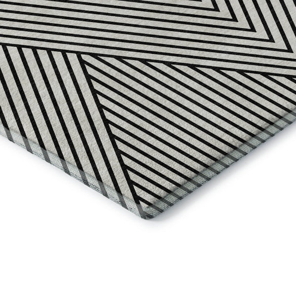 HomeRoots 5' X 8' Modern White and Black Geometric Area Rug - Washable, UV Protected, Stain Resistant Design 674684