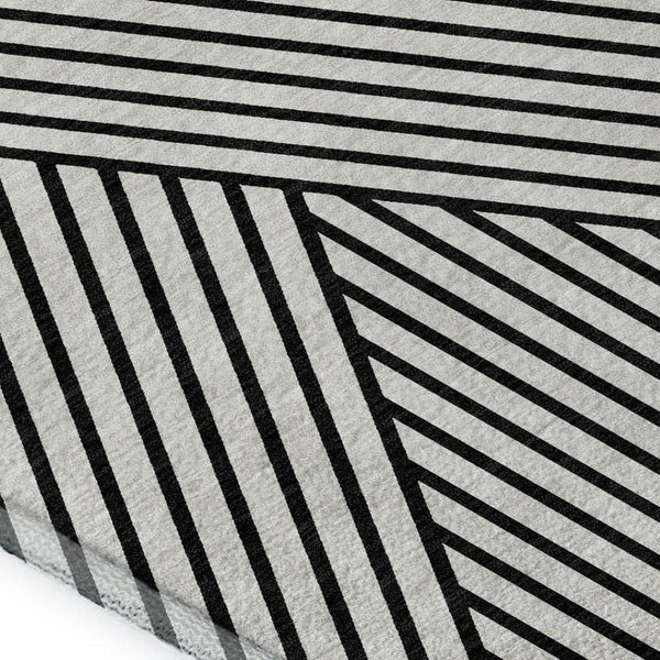 HomeRoots 5' X 8' Modern White and Black Geometric Area Rug - Washable, UV Protected, Stain Resistant Design 674684