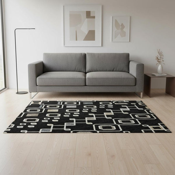 HomeRoots 5' X 8' Southwestern Black Ivory Gold Washable Area Rug – UV Protected, Stain-Resistant Design 674696