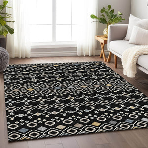 HomeRoots 5' X 8' Southwestern Black Ivory Gold Washable Area Rug – UV Protected, Stain-Resistant Design 674696