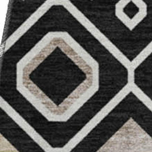 HomeRoots 8' Black Ivory & Gold Southwestern Washable Round Rug - Durable, UV-Protected, Stylish & Functional 674697