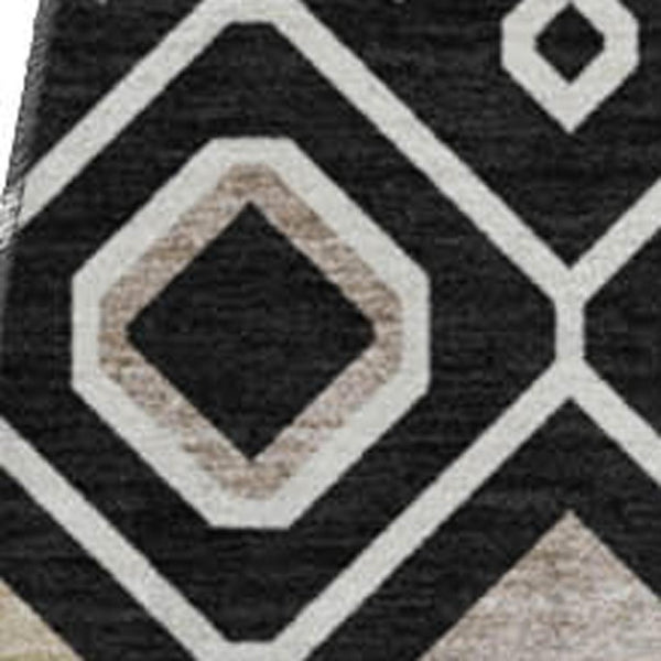 HomeRoots 8' Black Ivory & Gold Southwestern Washable Round Rug - Durable, UV-Protected, Stylish & Functional 674697