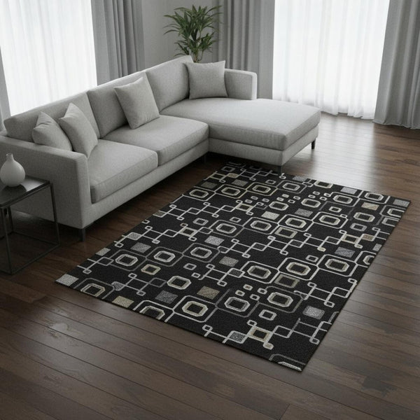 HomeRoots 10' X 14' Southwestern Washable Area Rug in Black, Ivory & Gold - Stylish, Durable & UV Protected 674700