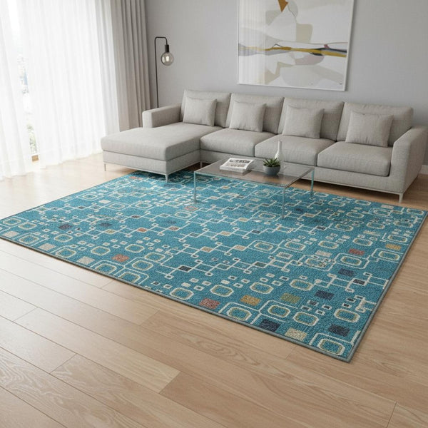 HomeRoots 9' X 12' Southwestern Area Rug in Teal Gold & Green – Washable, UV-Protected, Durable & Stylish! 674753
