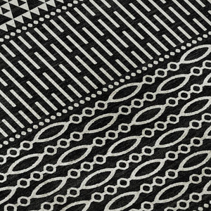 HomeRoots 8' Black and Ivory Striped Washable Round Rug - Durable, UV Protected, Ideal for Busy Households! 674763