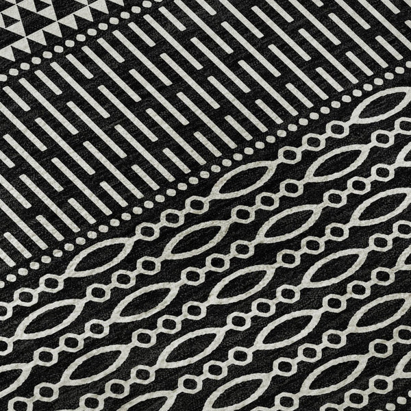 HomeRoots 8' Black and Ivory Striped Washable Round Rug - Durable, UV Protected, Ideal for Busy Households! 674763