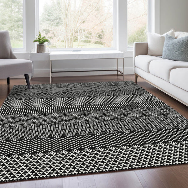 HomeRoots 8' X 10' Black and Ivory Striped Area Rug – Washable, UV Protected, Durable for High-Traffic Spaces! 674764