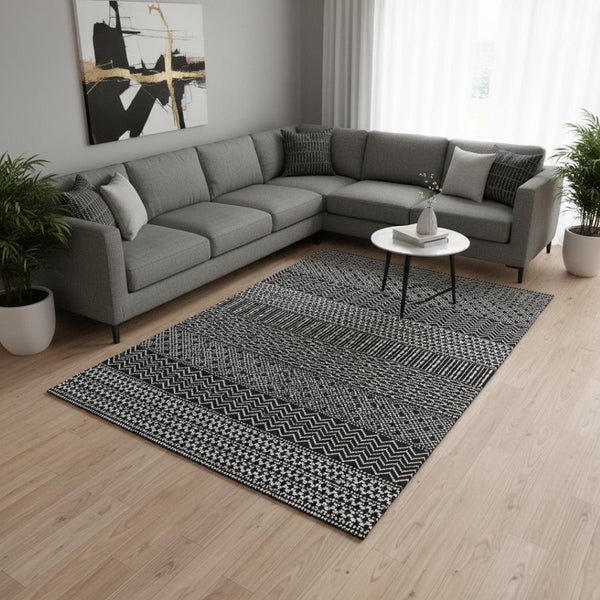 HomeRoots 9' X 12' Black And Ivory Striped Area Rug – Durable, Washable, UV-Protected for High-Traffic Spaces 674765