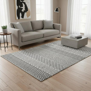 HomeRoots 5' X 8' Stylish White and Black Striped Area Rug – Washable, UV-Protected, Durable for High Traffic Areas 674822