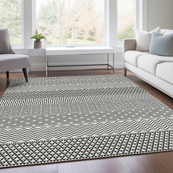 HomeRoots 5' X 8' Stylish White and Black Striped Area Rug – Washable, UV-Protected, Durable for High Traffic Areas 674822