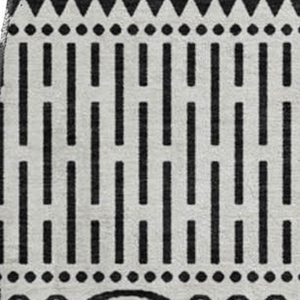 HomeRoots 8' White and Black Striped Washable Round Rug - Durable, UV-Protected, Easy-Care Design for Any Space 674823