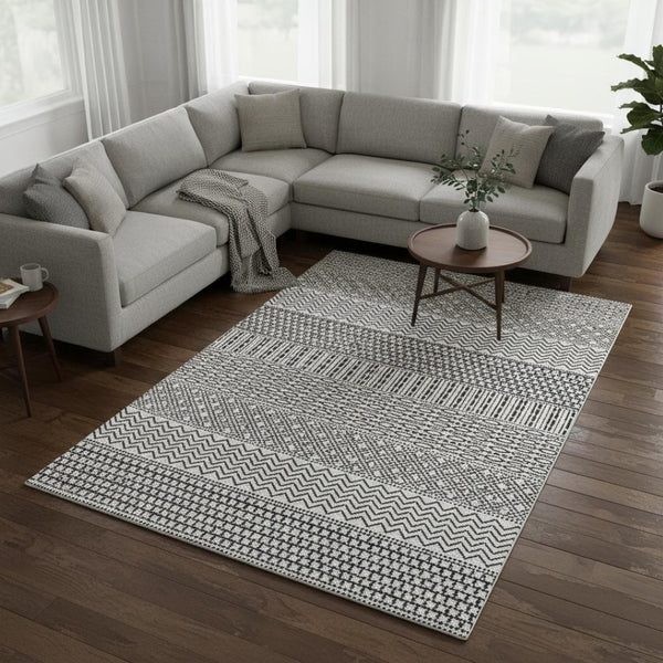 HomeRoots 9' X 12' Striped Washable Area Rug - Stylish Black & White Design with UV Protection for Durability 674825