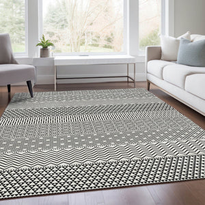 HomeRoots 10' X 14' Washable White and Black Striped Area Rug with UV Protection for High-Traffic Spaces 674826
