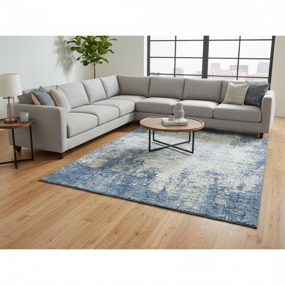 HomeRoots 9' X 12' Abstract Denim Blue and Ivory Area Rug - Washable, UV Protected, Stain-Resistant Design 674843