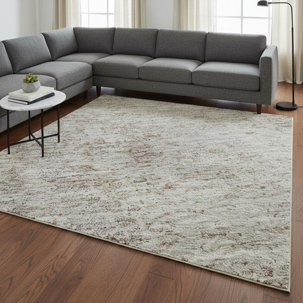 HomeRoots 8' X 10' Taupe and Ivory Abstract Area Rug - Stylish, Washable, UV Protected for Family Spaces 674890