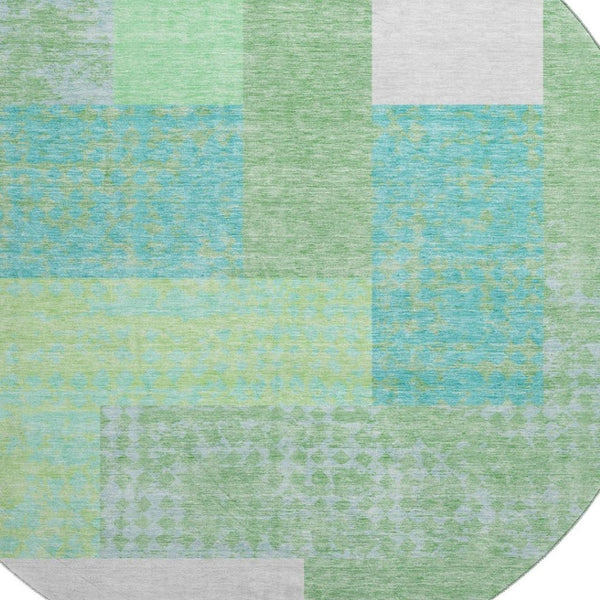 HomeRoots 8' Artichoke Green, Teal & Ivory Geometric Round Rug - Washable, UV Protected & Durable Home Decor 674907