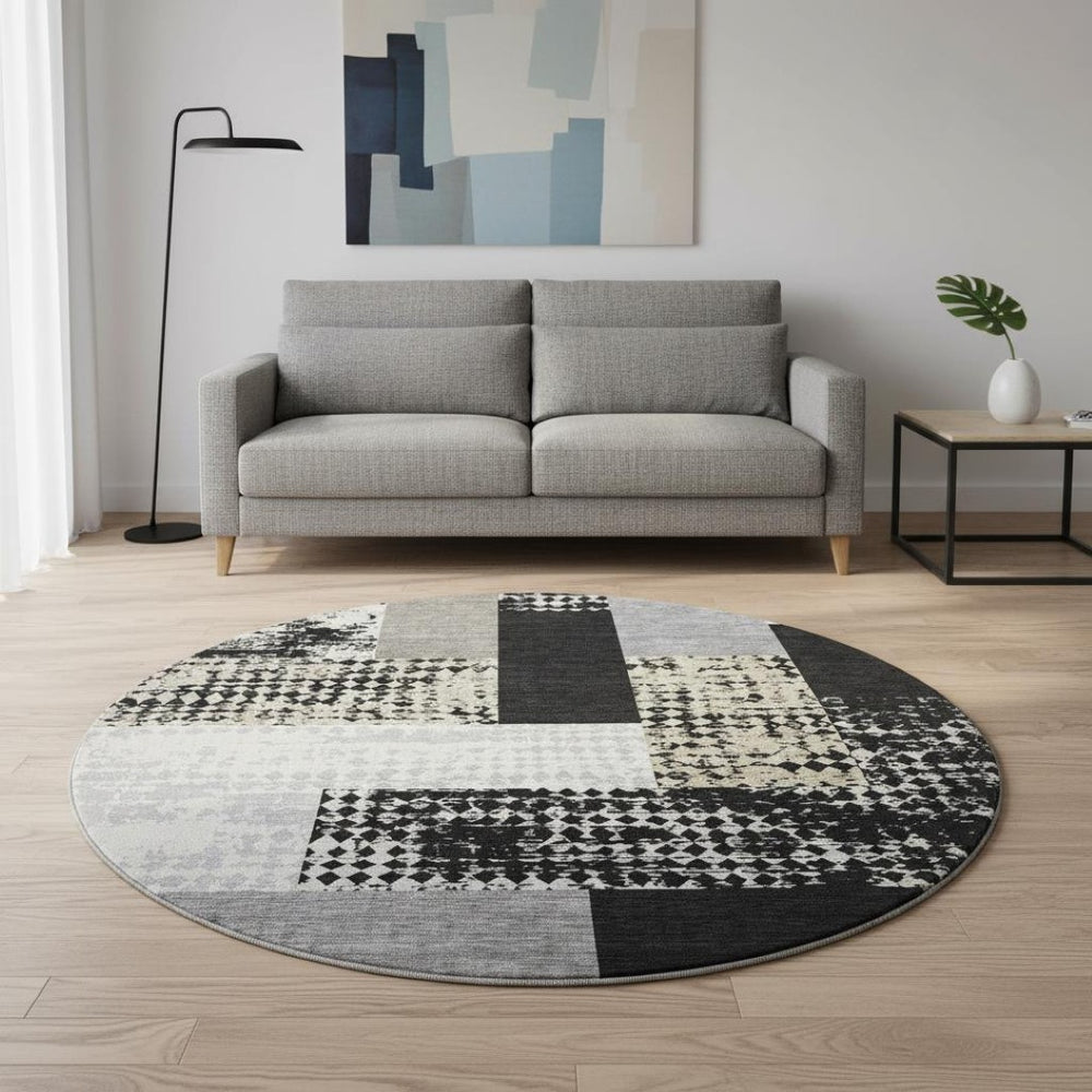 HomeRoots 8' Black Ivory And Beige Geometric Round Rug - Washable, UV Protected, Durable for Homes & Patios 674913