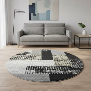 HomeRoots 8' Black Ivory And Beige Geometric Round Rug - Washable, UV Protected, Durable for Homes & Patios 674913