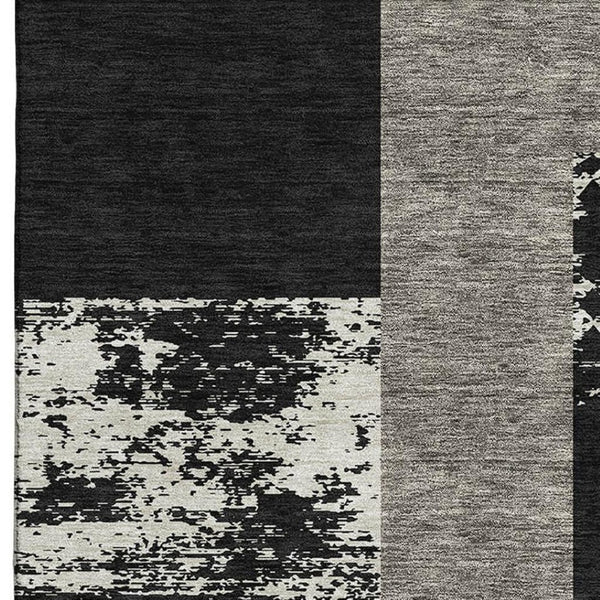HomeRoots 8' X 10' Geometric Black, Ivory & Beige Area Rug - Washable, UV-Protected, Stylish & Durable Design 674914