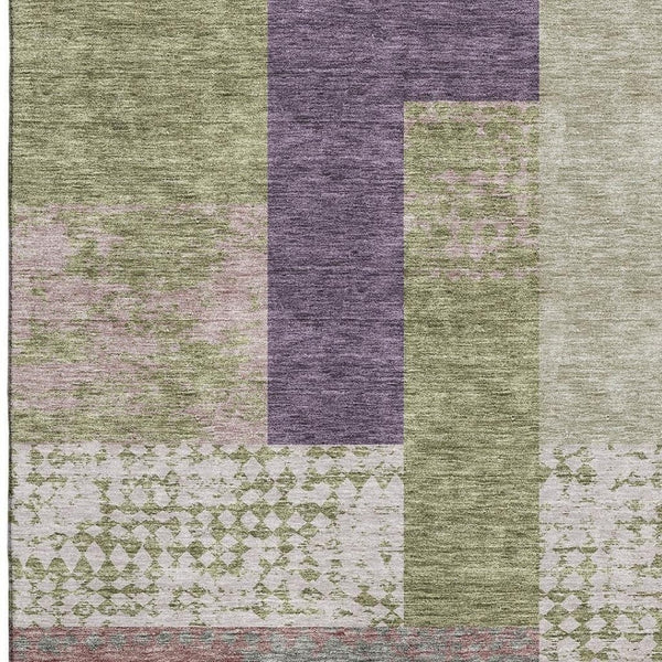 HomeRoots 9' X 12' Washable Geometric Area Rug in Green, Ivory & Purple with UV Protection for Modern Spaces 674945