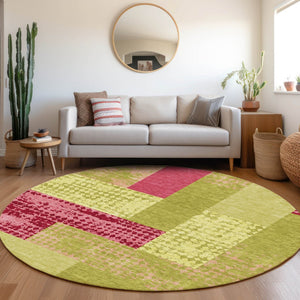 HomeRoots 8' Vibrant Lime Green and Pink Geometric Washable Round Rug with UV Protection for Modern Spaces 674955