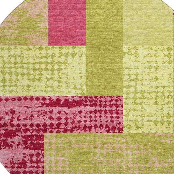 HomeRoots 8' Vibrant Lime Green and Pink Geometric Washable Round Rug with UV Protection for Modern Spaces 674955