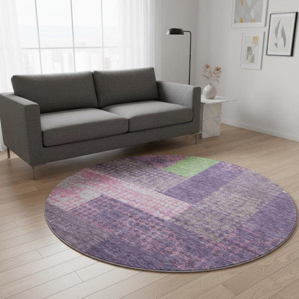 HomeRoots 8' Vibrant Purple Green Pink Geometric Washable Round Rug with UV Protection for Family Spaces 674973