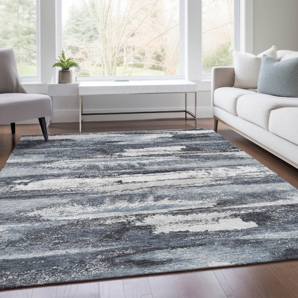 HomeRoots 5' X 8' Modern Gray and Ivory Abstract Area Rug - Washable, UV-Protected, Perfect for High-Traffic Areas 675008